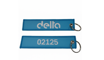 Delta nøkkelring med vevd tag